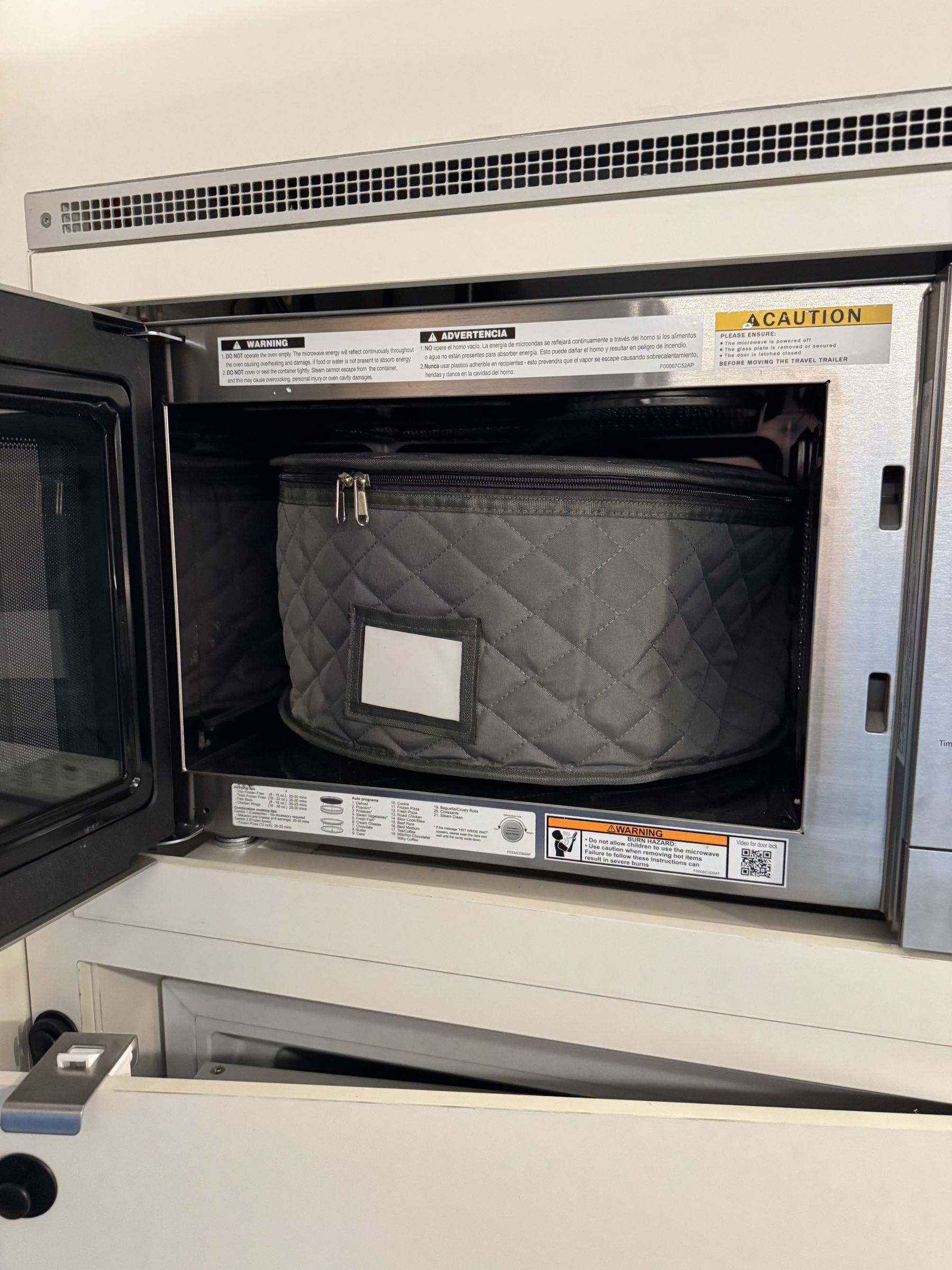 Snug storage case to keep microwave accessories from moving (image 4 of 4)